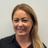 Foto av gruppchefen Ida Edström, som ler mot kameran