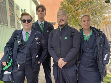 Fyra Seko-medlemmar på SJ iklädda arbetskläder